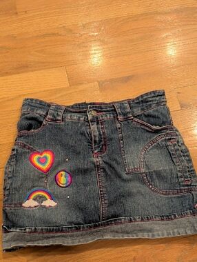 Lisa Frank Girls' Dark Wash Denim Skort with Rainbow Patches